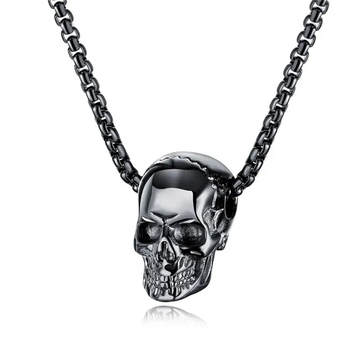 Earrings Gold Shield Cadenas para hombres con dije de calavera